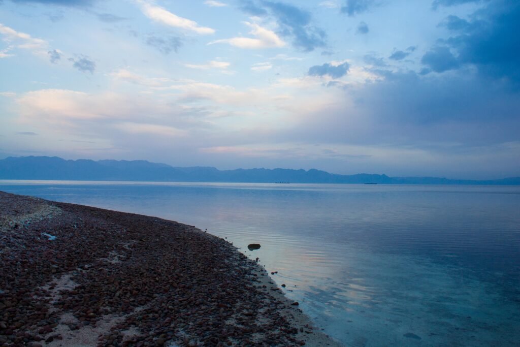 Calm Red Sea water at dusk on the Gulf of Aqaba coast of Sinai